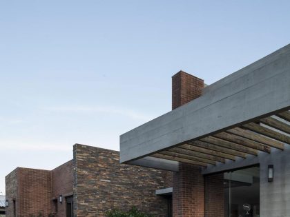 A Stylish Contemporary Home Made of Concrete and Red Bricks in Rio Grande do Sul by Ramella Arquitetura (2)