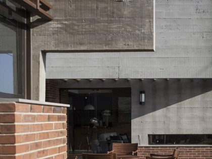 A Stylish Contemporary Home Made of Concrete and Red Bricks in Rio Grande do Sul by Ramella Arquitetura (3)