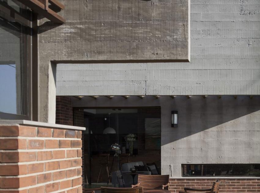 A Stylish Contemporary Home Made of Concrete and Red Bricks in Rio Grande do Sul by Ramella Arquitetura (3)