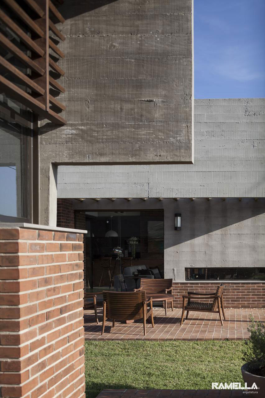 A Stylish Contemporary Home Made of Concrete and Red Bricks in Rio Grande do Sul by Ramella Arquitetura (3)