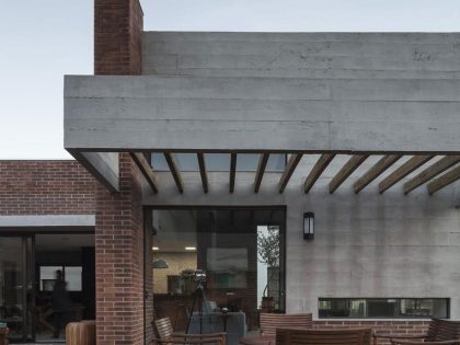 A Stylish Contemporary Home Made of Concrete and Red Bricks in Rio Grande do Sul by Ramella Arquitetura (4)