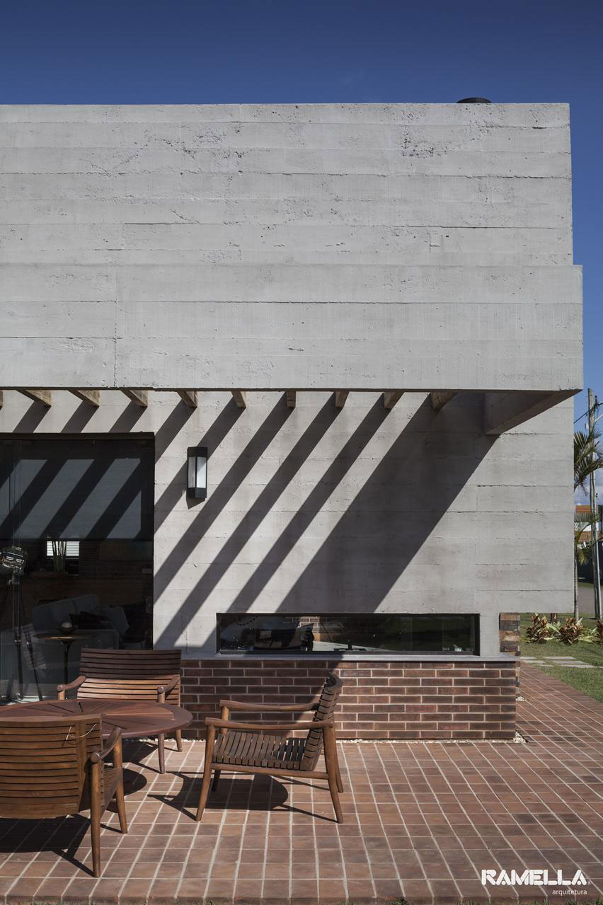 A Stylish Contemporary Home Made of Concrete and Red Bricks in Rio Grande do Sul by Ramella Arquitetura (5)