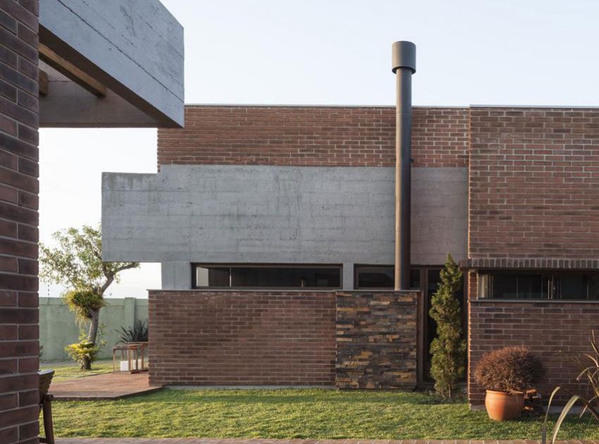 A Stylish Contemporary Home Made of Concrete and Red Bricks in Rio Grande do Sul by Ramella Arquitetura (6)