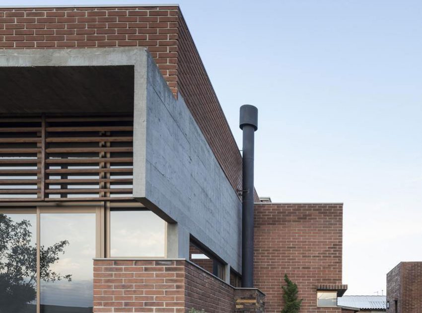 A Stylish Contemporary Home Made of Concrete and Red Bricks in Rio Grande do Sul by Ramella Arquitetura (7)