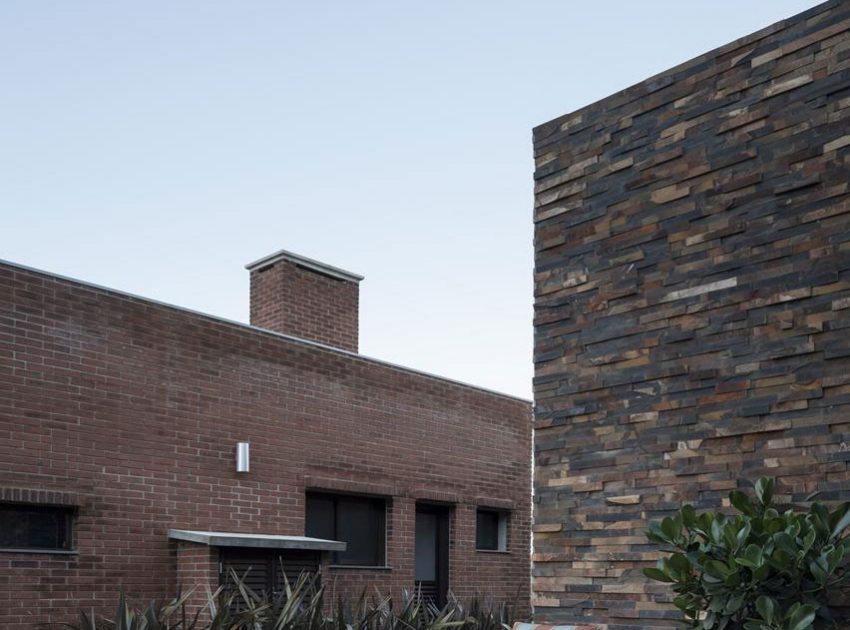 A Stylish Contemporary Home Made of Concrete and Red Bricks in Rio Grande do Sul by Ramella Arquitetura (9)