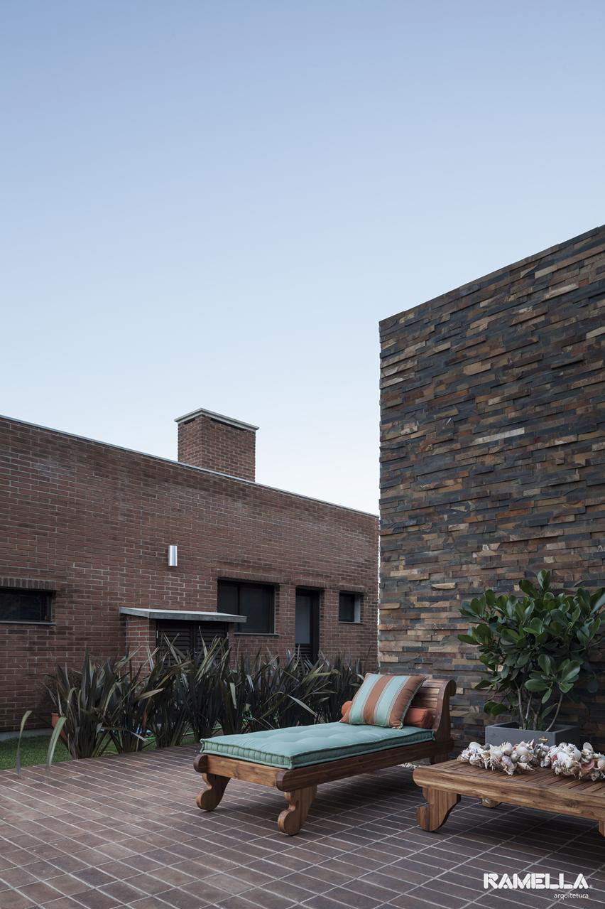 A Stylish Contemporary Home Made of Concrete and Red Bricks in Rio Grande do Sul by Ramella Arquitetura (9)