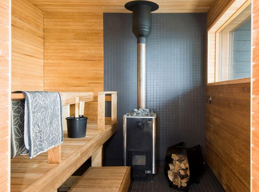 A Stylish Modern Vacation House Built on Rocks in Merimasku, Finland by Haroma & Partners (9)