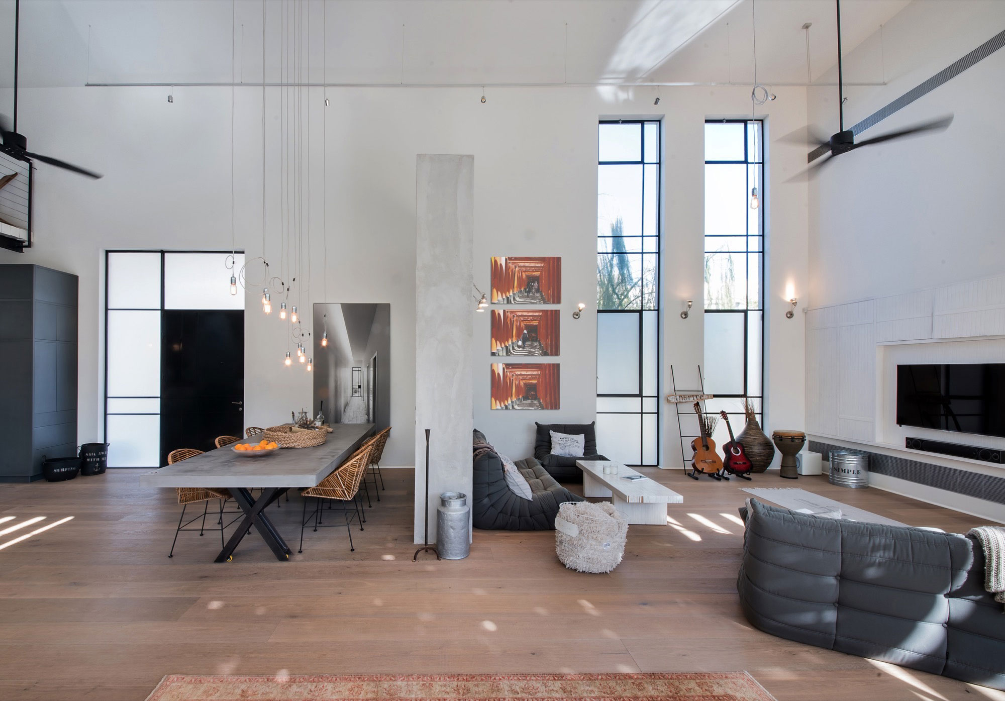 A Stylish and Spacious Concrete House with Luminous Interiors in Tel Aviv by Neuman Hayner Architects (11)