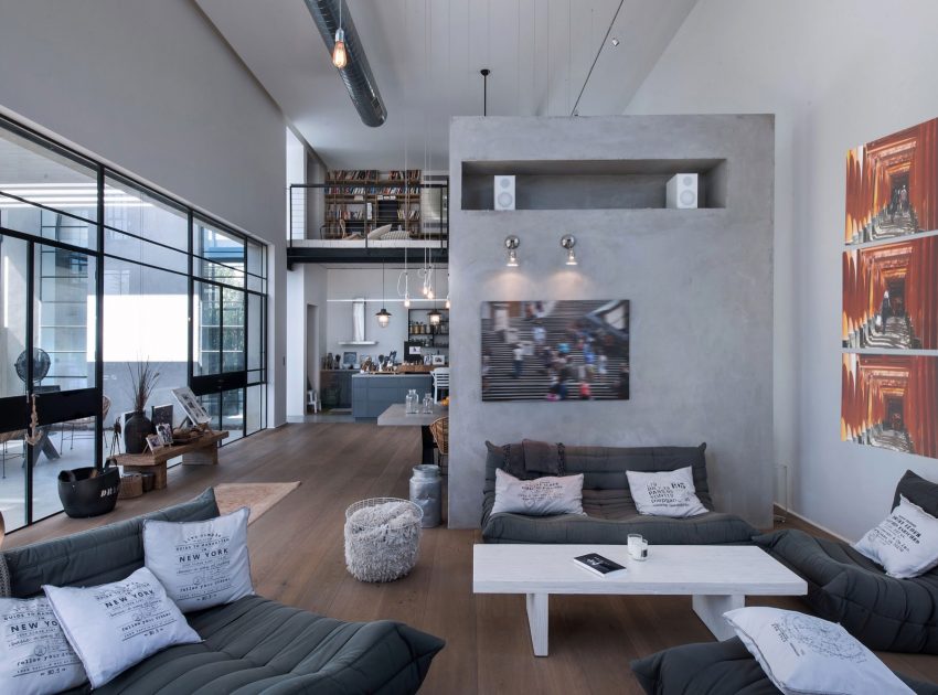 A Stylish and Spacious Concrete House with Luminous Interiors in Tel Aviv by Neuman Hayner Architects (12)
