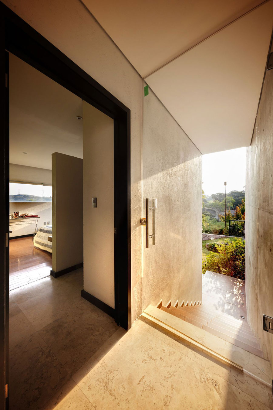 A Sustainable Contemporary Home with a Large L-Shaped Concrete Walls in Mexico by REC Arquitectura (13)