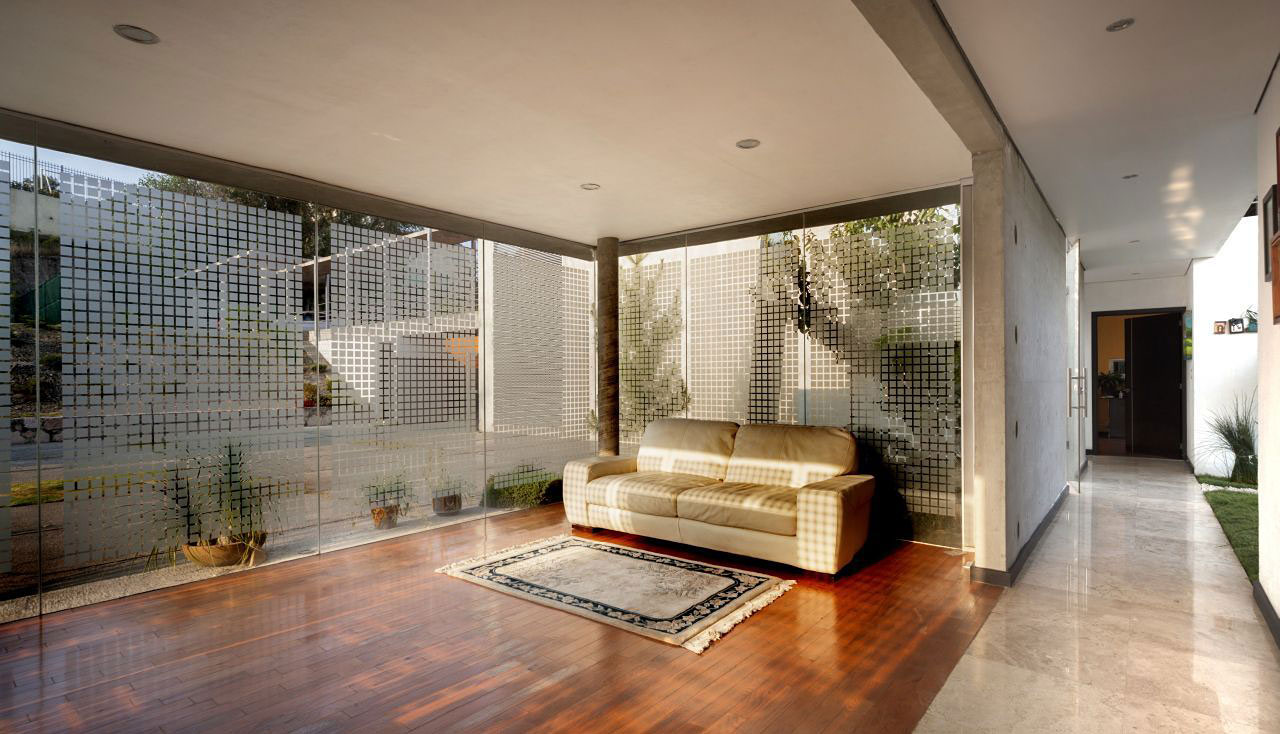 A Sustainable Contemporary Home with a Large L-Shaped Concrete Walls in Mexico by REC Arquitectura (15)