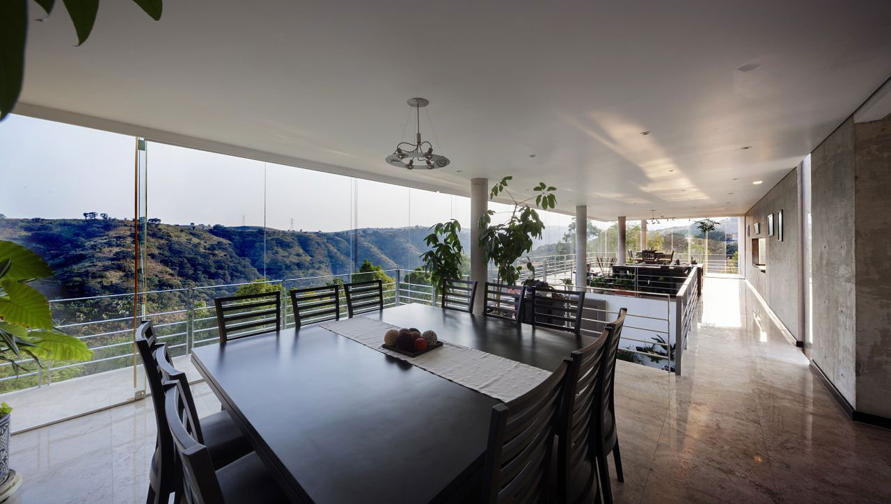 A Sustainable Contemporary Home with a Large L-Shaped Concrete Walls in Mexico by REC Arquitectura (7)