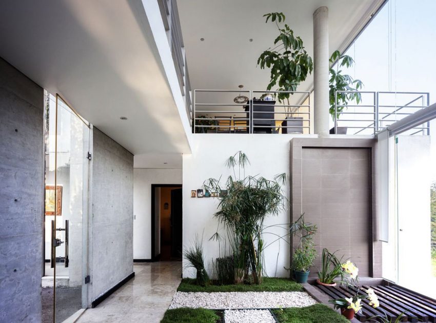 A Sustainable Contemporary Home with a Large L-Shaped Concrete Walls in Mexico by REC Arquitectura (8)