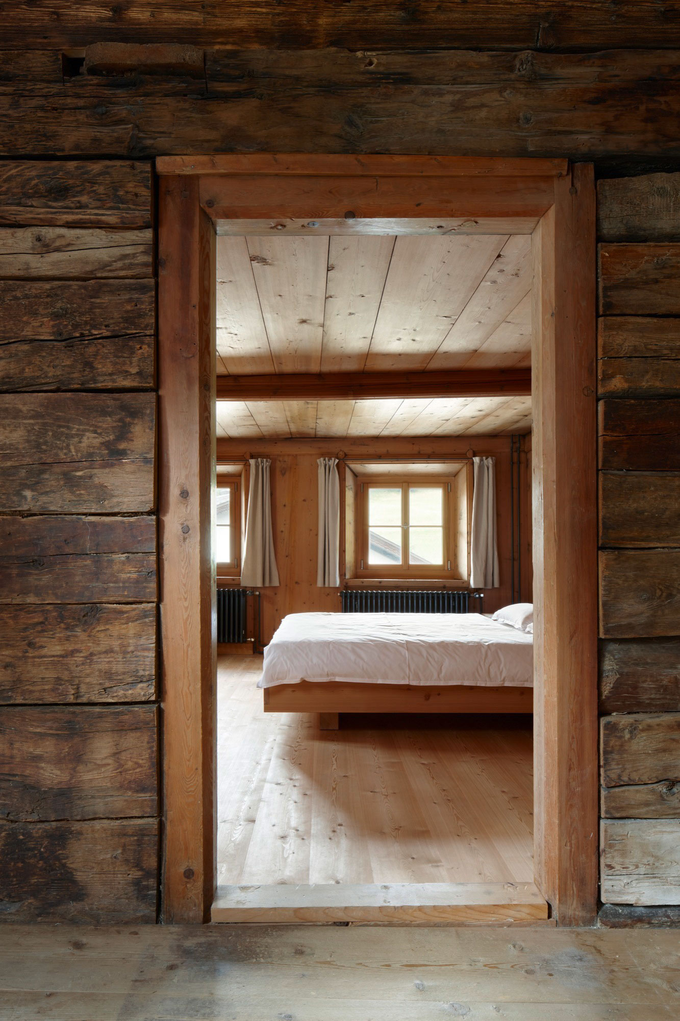 A Traditional Farmhouse Converted Into a Timeless Contemporary House in Scuol, Switzerland by Philipp Baumhauer Architects (21)