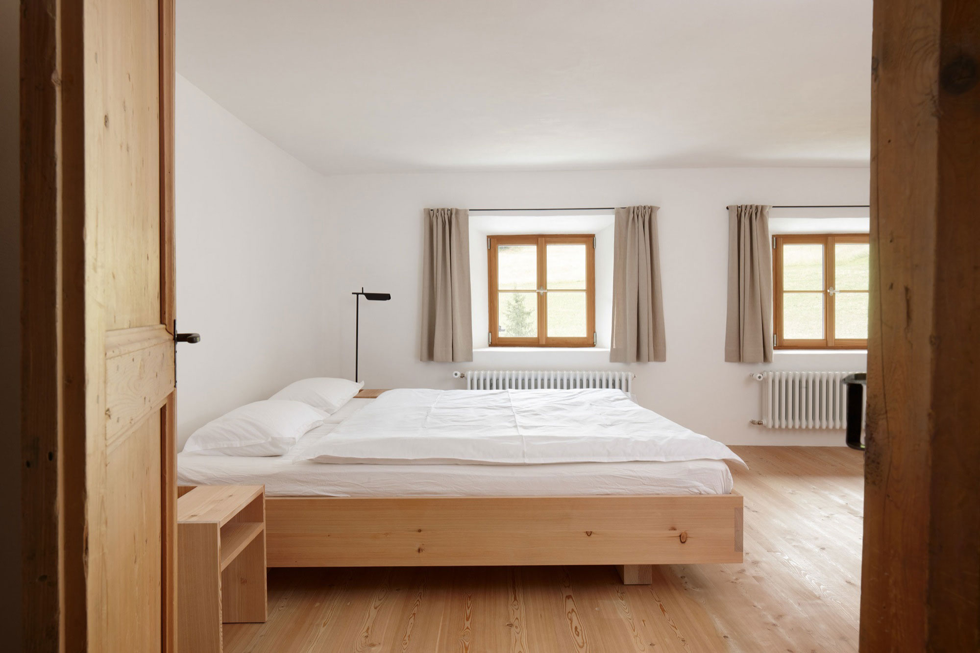 A Traditional Farmhouse Converted Into a Timeless Contemporary House in Scuol, Switzerland by Philipp Baumhauer Architects (22)