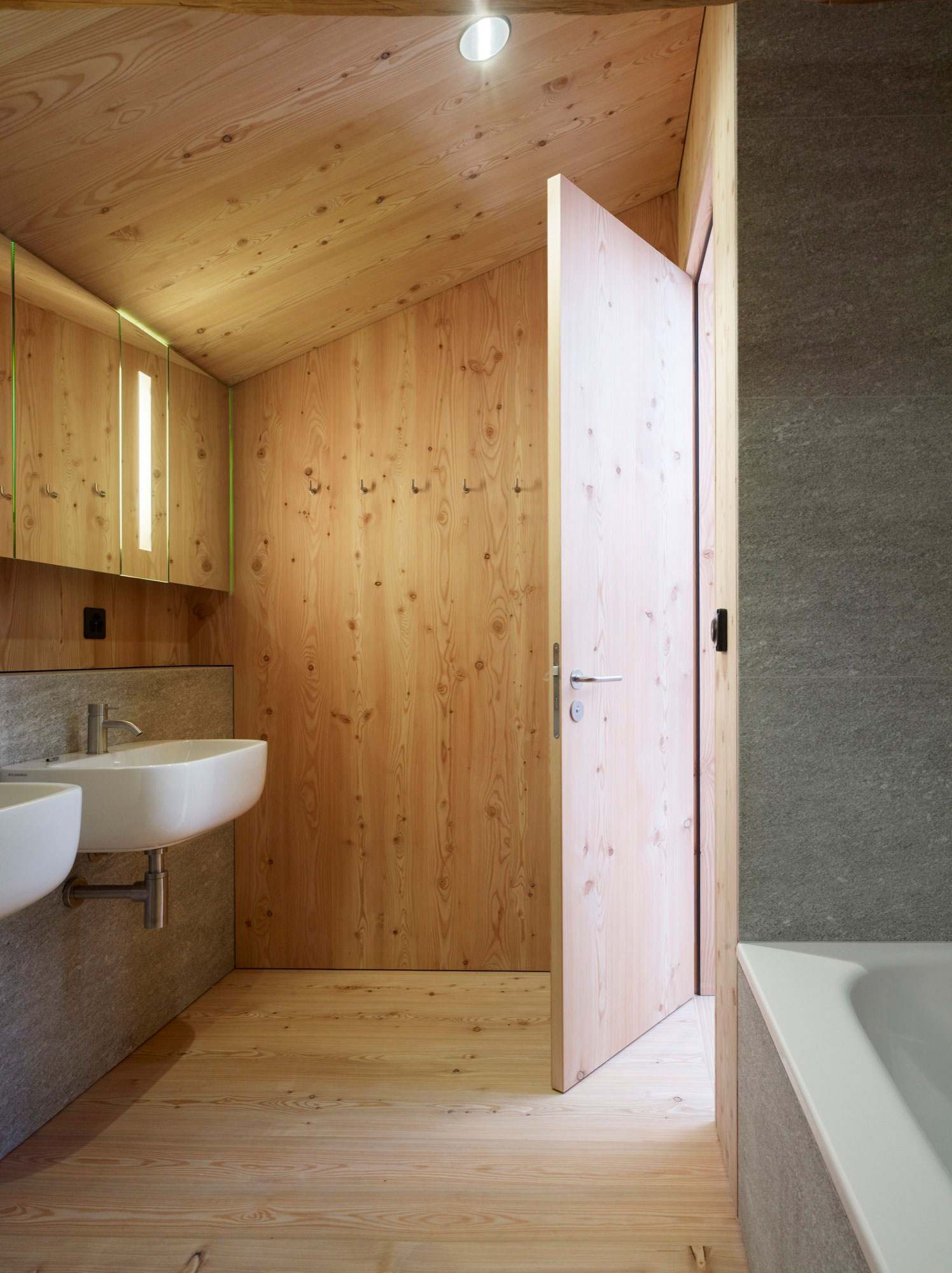 A Traditional Farmhouse Converted Into a Timeless Contemporary House in Scuol, Switzerland by Philipp Baumhauer Architects (25)