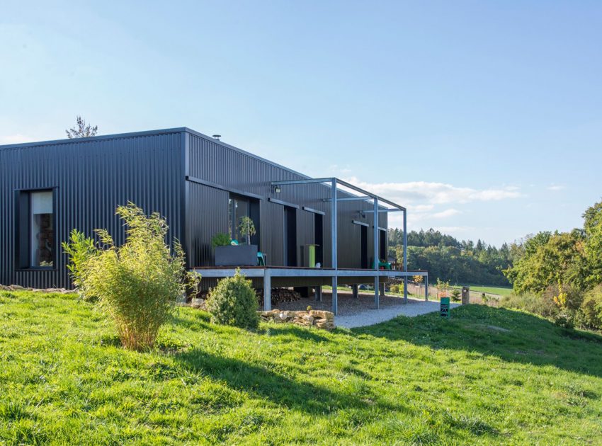 A Two Shipping Containers Turned into a Modern House for a Writer and Sculptor in Saint-Bresson by Spray Architecture & Gabrielle Vella-Boucaud (1)