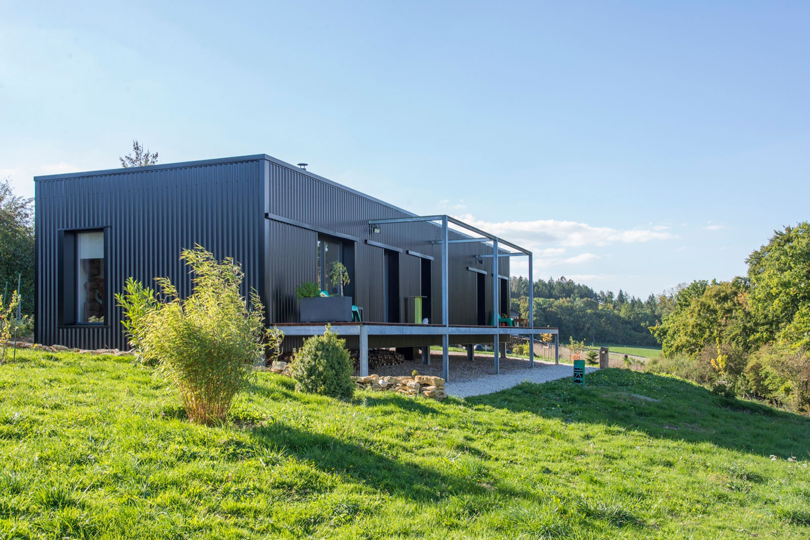 A Two Shipping Containers Turned into a Modern House for a Writer and Sculptor in Saint-Bresson by Spray Architecture & Gabrielle Vella-Boucaud (1)