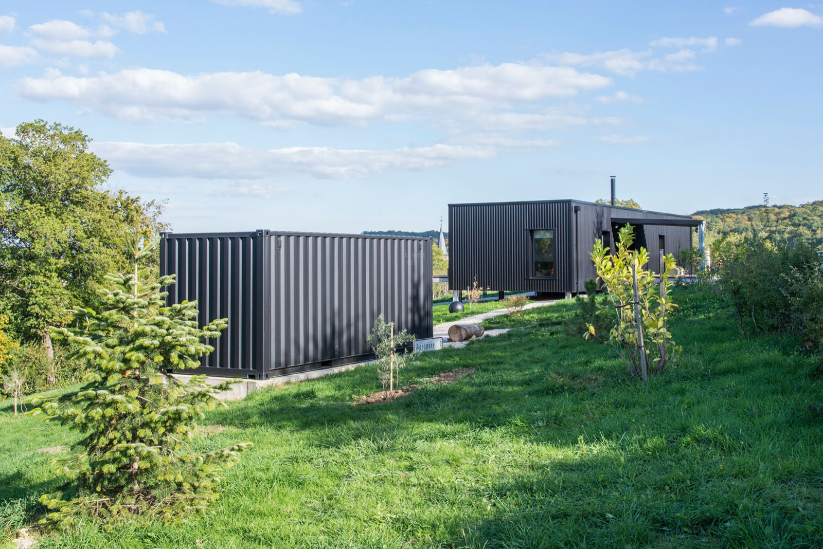 A Two Shipping Containers Turned into a Modern House for a Writer and Sculptor in Saint-Bresson by Spray Architecture & Gabrielle Vella-Boucaud (2)