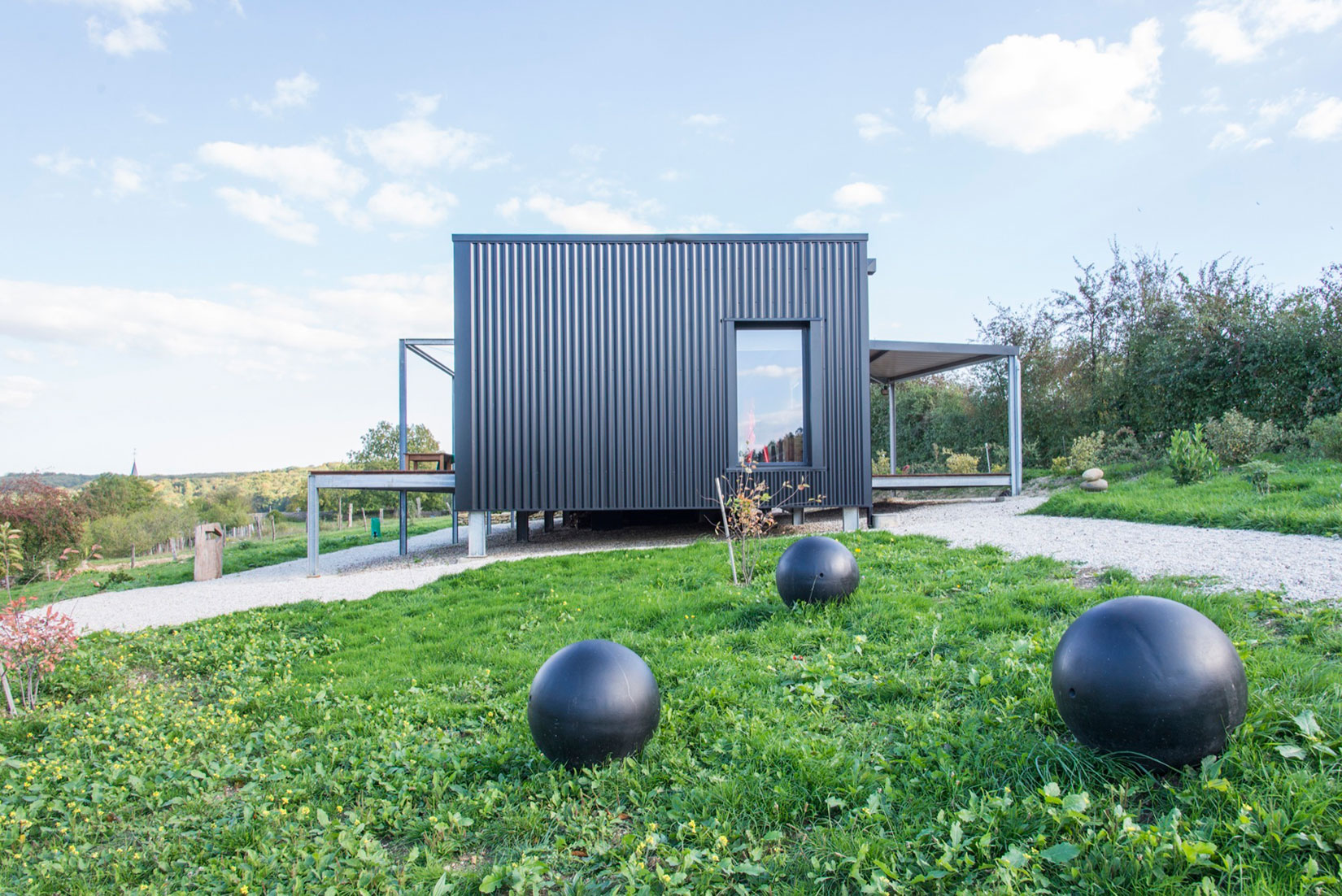A Two Shipping Containers Turned into a Modern House for a Writer and Sculptor in Saint-Bresson by Spray Architecture & Gabrielle Vella-Boucaud (4)