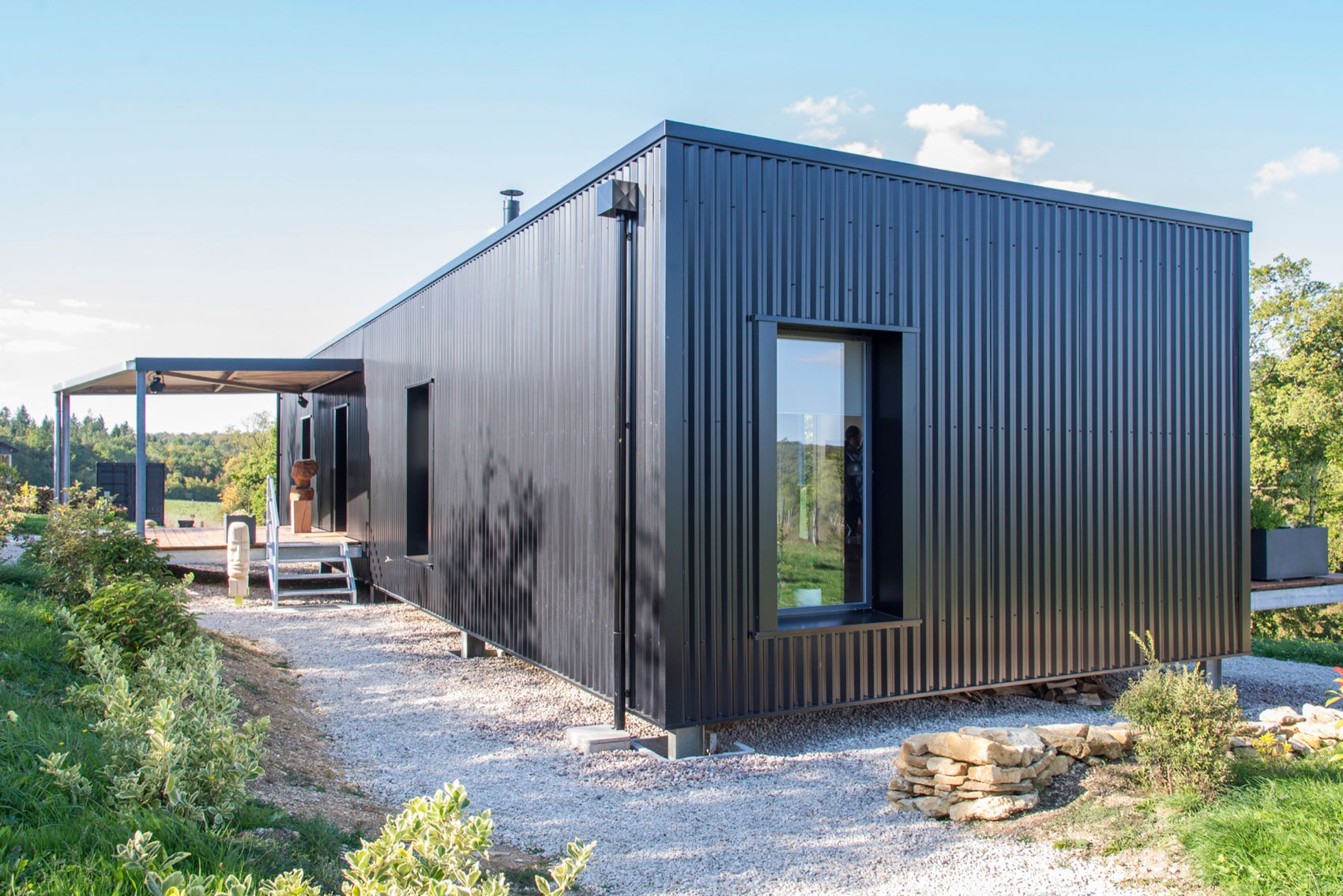 A Two Shipping Containers Turned into a Modern House for a Writer and Sculptor in Saint-Bresson by Spray Architecture & Gabrielle Vella-Boucaud (8)