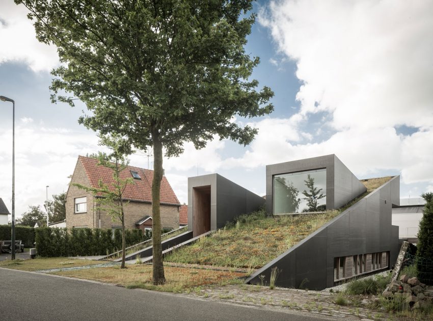 A Unique Modern Home with Sloping Green Roof and Split-Level Interior in Maldegem, Belgium by OYO (1)