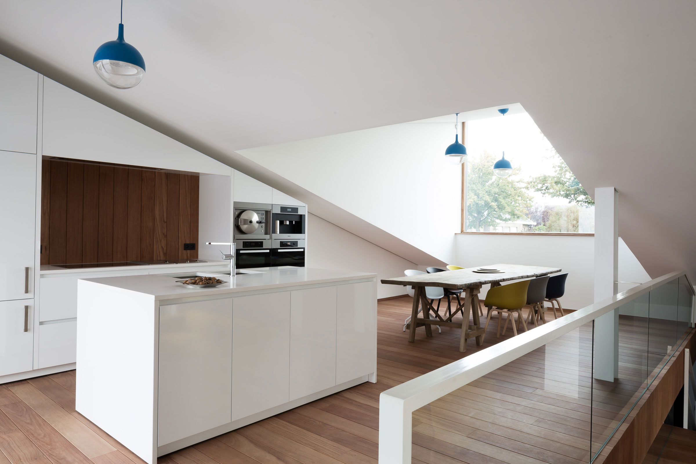 A Unique Modern Home with Sloping Green Roof and Split-Level Interior in Maldegem, Belgium by OYO (10)