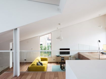 A Unique Modern Home with Sloping Green Roof and Split-Level Interior in Maldegem, Belgium by OYO (7)