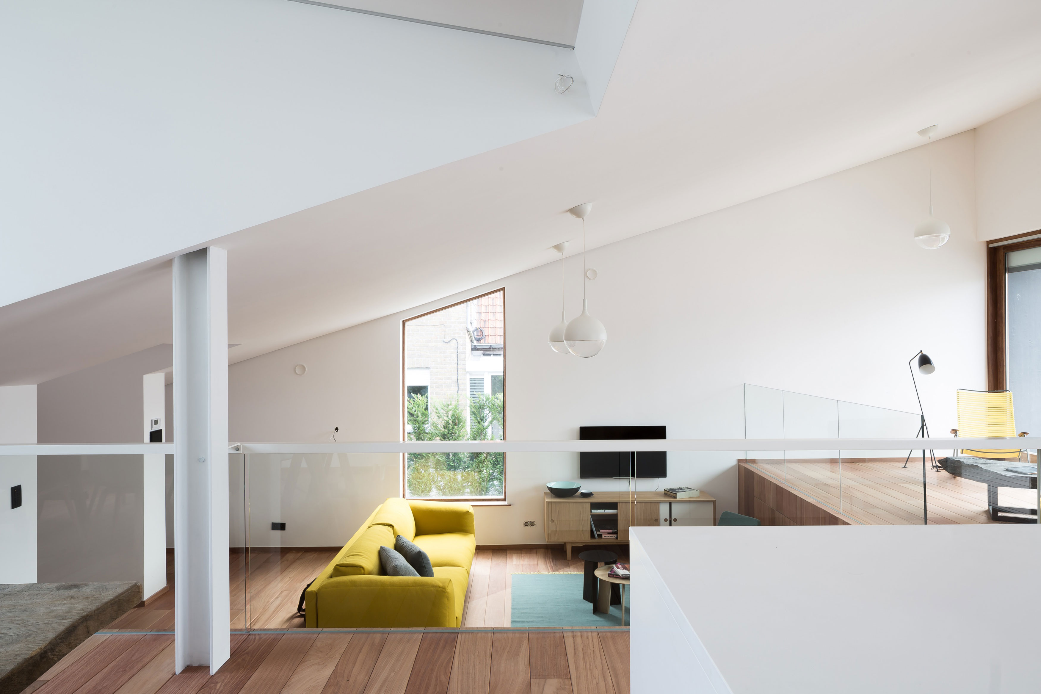 A Unique Modern Home with Sloping Green Roof and Split-Level Interior in Maldegem, Belgium by OYO (7)