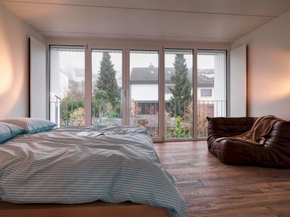 A Vertical Modern House for Three Generations Under the One Roof in Dällikon, Switzerland by Daniele Claudio Taddei Architect (13)