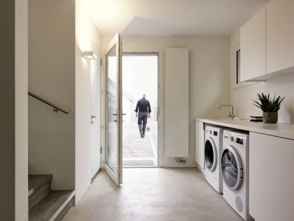 A Vertical Modern House for Three Generations Under the One Roof in Dällikon, Switzerland by Daniele Claudio Taddei Architect (17)