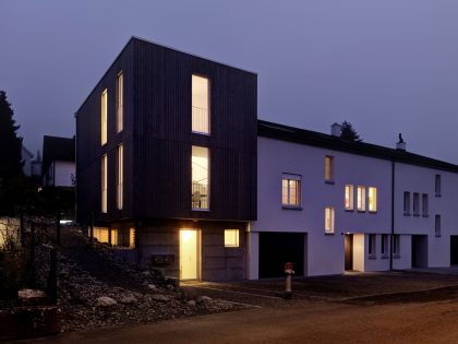 A Vertical Modern House for Three Generations Under the One Roof in Dällikon, Switzerland by Daniele Claudio Taddei Architect (21)