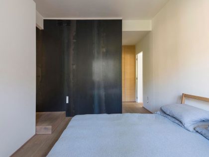 An Elegant Apartment Dominated by Shades of Gray and White Colors by Luca Compri (14)