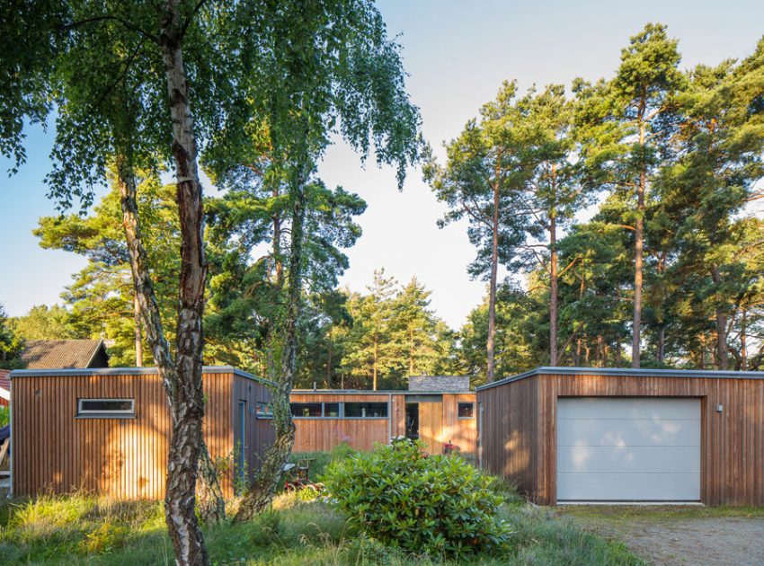 An Elegant Contemporary Villa Surrounded by Tall Pine Trees in Höllviken, Sweden by Johan Sundberg (1)