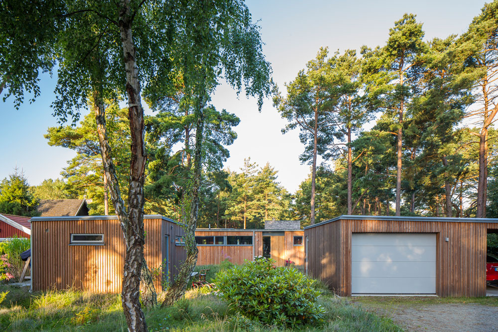 An Elegant Contemporary Villa Surrounded by Tall Pine Trees in Höllviken, Sweden by Johan Sundberg (1)