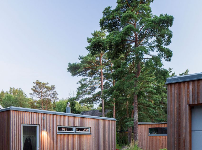 An Elegant Contemporary Villa Surrounded by Tall Pine Trees in Höllviken, Sweden by Johan Sundberg (14)