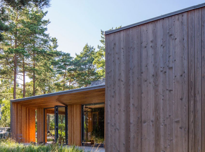 An Elegant Contemporary Villa Surrounded by Tall Pine Trees in Höllviken, Sweden by Johan Sundberg (3)