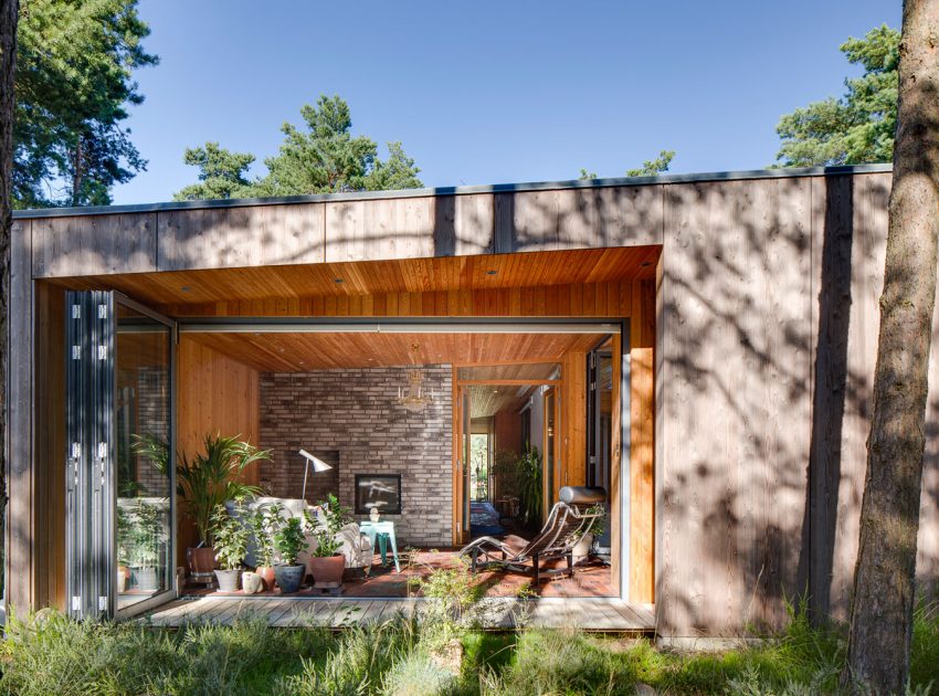 An Elegant Contemporary Villa Surrounded by Tall Pine Trees in Höllviken, Sweden by Johan Sundberg (6)