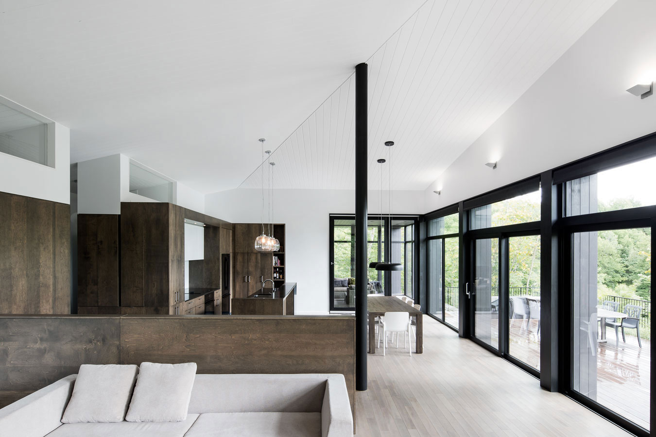 An Elegant L-Shaped House with Futuristic Interiors in Lac de la Cabane, Canada by naturehumaine (10)