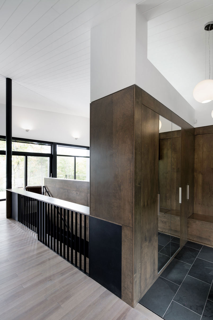 An Elegant L-Shaped House with Futuristic Interiors in Lac de la Cabane, Canada by naturehumaine (18)