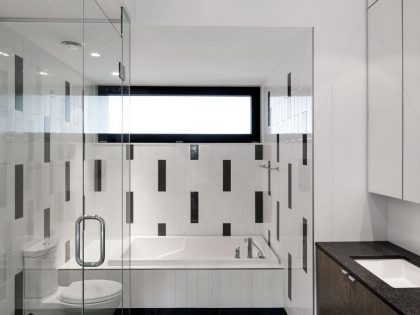 An Elegant L-Shaped House with Futuristic Interiors in Lac de la Cabane, Canada by naturehumaine (20)