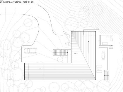 An Elegant L-Shaped House with Futuristic Interiors in Lac de la Cabane, Canada by naturehumaine (23)