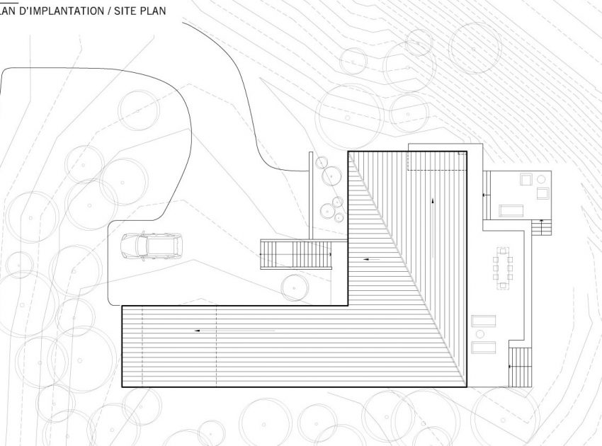 An Elegant L-Shaped House with Futuristic Interiors in Lac de la Cabane, Canada by naturehumaine (23)