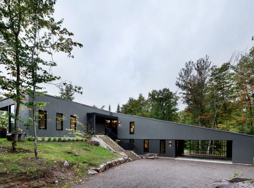 An Elegant L-Shaped House with Futuristic Interiors in Lac de la Cabane, Canada by naturehumaine (6)