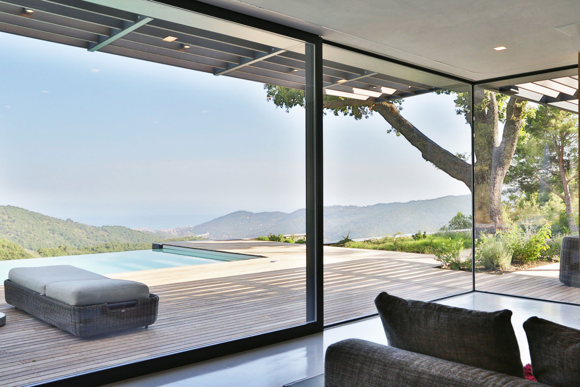 An Elegant Mediterranean Villa with Natural Stone Façade in Imperia, Italy by Giordano Hadamik Architects (11)