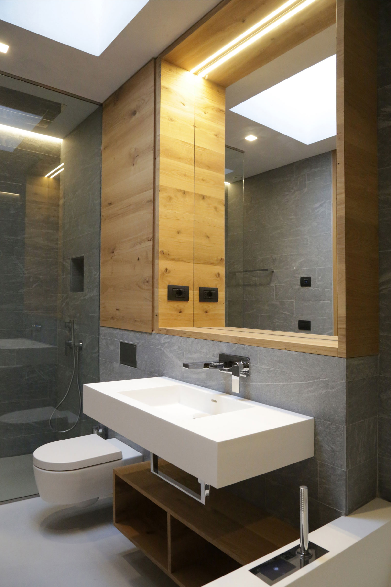 An Elegant Mediterranean Villa with Natural Stone Façade in Imperia, Italy by Giordano Hadamik Architects (18)