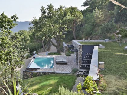 An Elegant Mediterranean Villa with Natural Stone Façade in Imperia, Italy by Giordano Hadamik Architects (2)