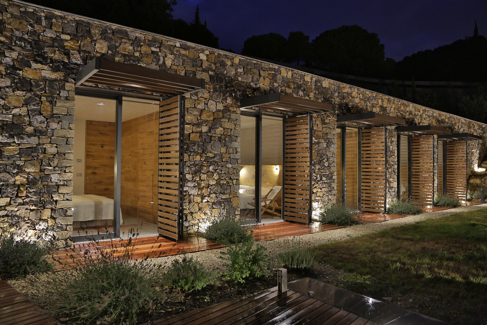 An Elegant Mediterranean Villa with Natural Stone Façade in Imperia, Italy by Giordano Hadamik Architects (25)