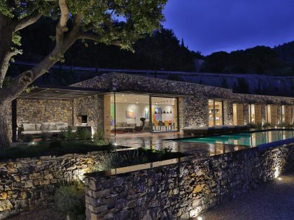 An Elegant Mediterranean Villa with Natural Stone Façade in Imperia, Italy by Giordano Hadamik Architects (26)