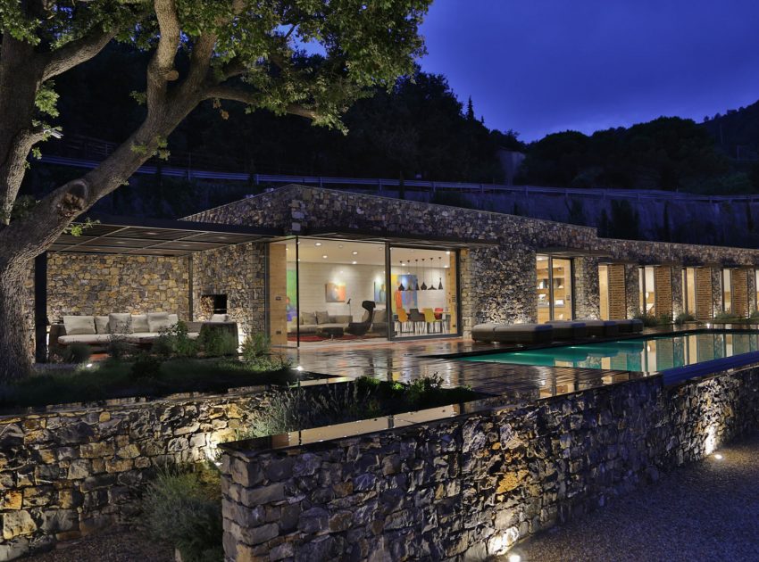 An Elegant Mediterranean Villa with Natural Stone Façade in Imperia, Italy by Giordano Hadamik Architects (26)